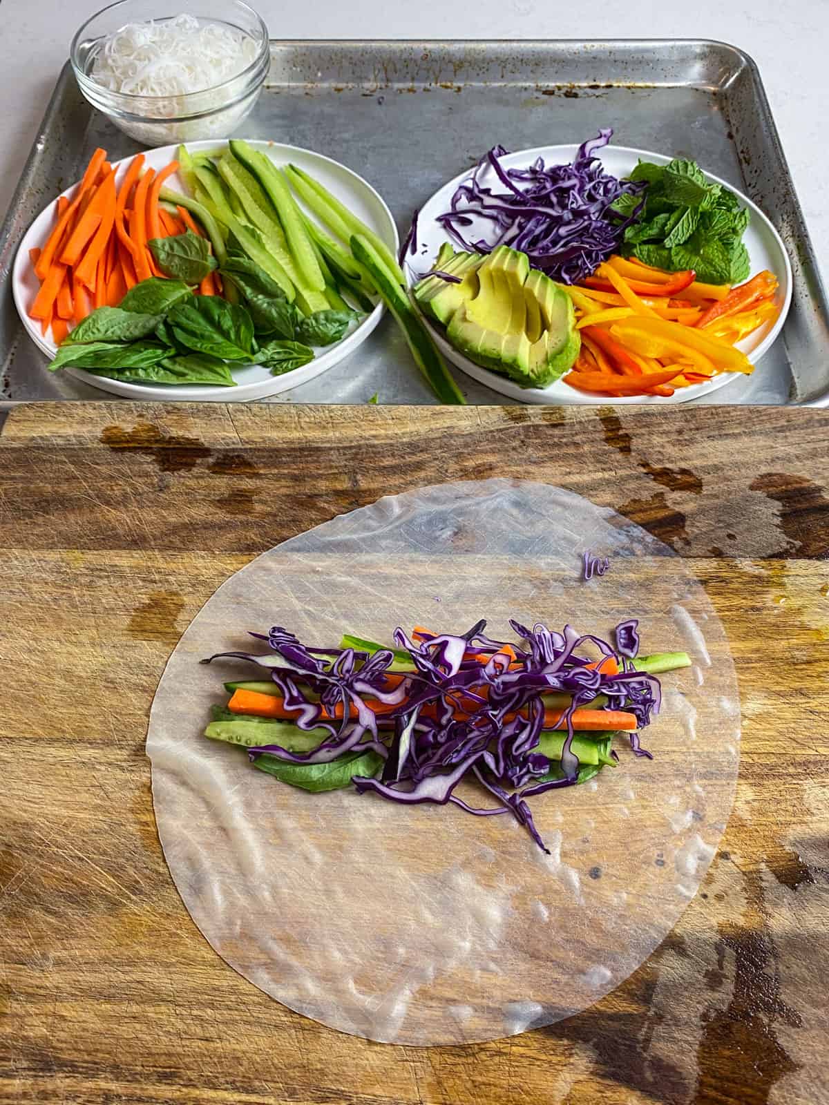 Add vegetables to the fresh spring rolls.