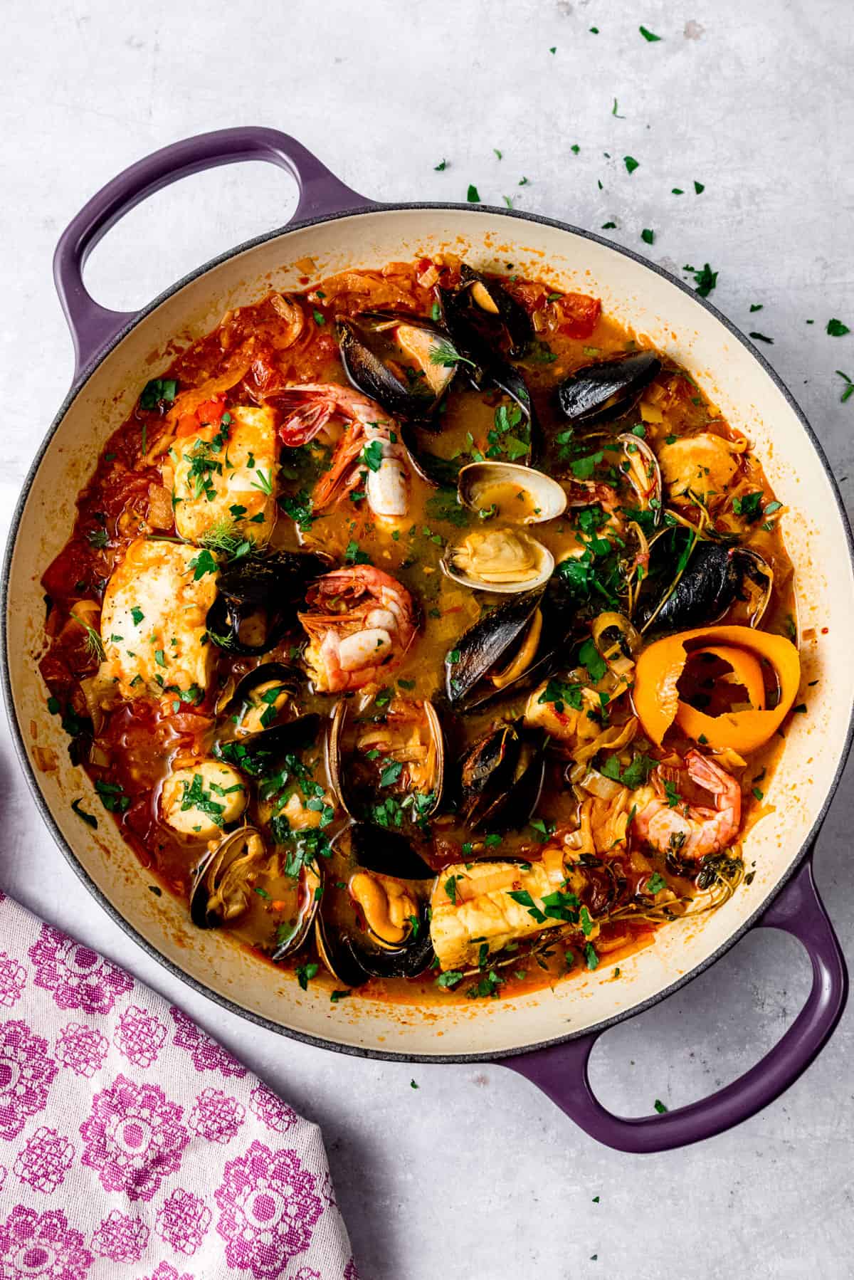 Easy bouillabaisse recipe, French seafood stew with mussels, clams and halibut.