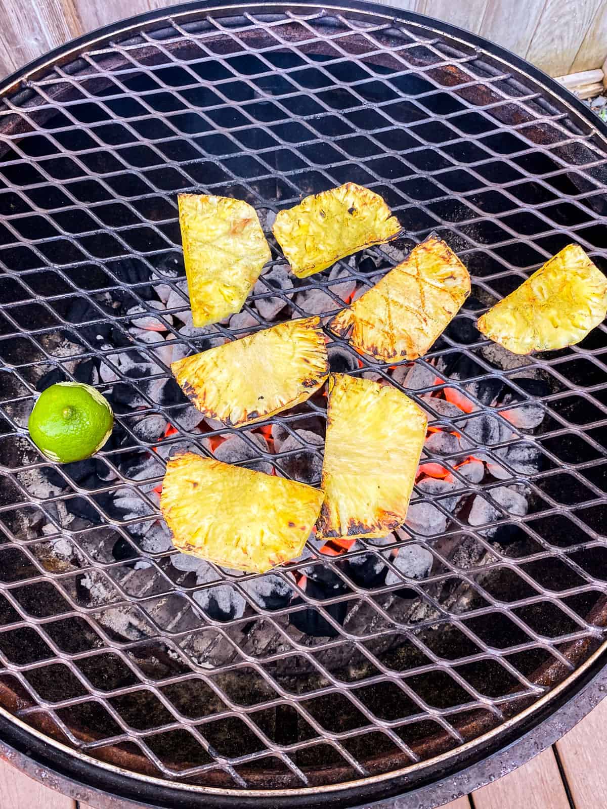 Grill pineapple slices until charred on the edges.