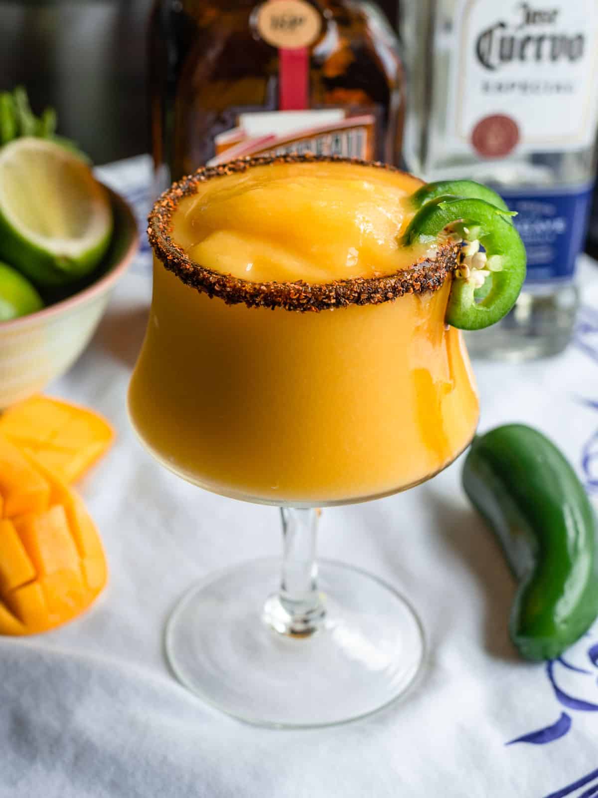 Jalapeño mango margarita with tamarind and tajin rim.