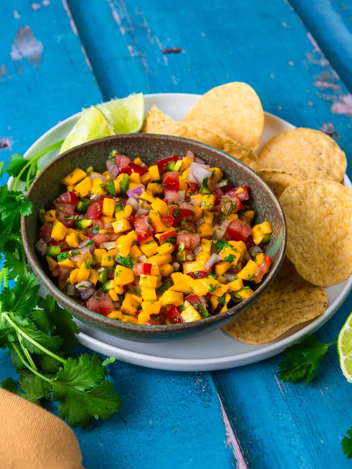 Serve mango pico de gallo with extra lime and tortilla chips.