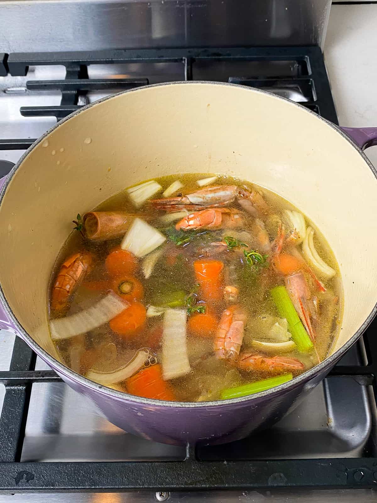 Simmer the seafood stock for 30 minutes.