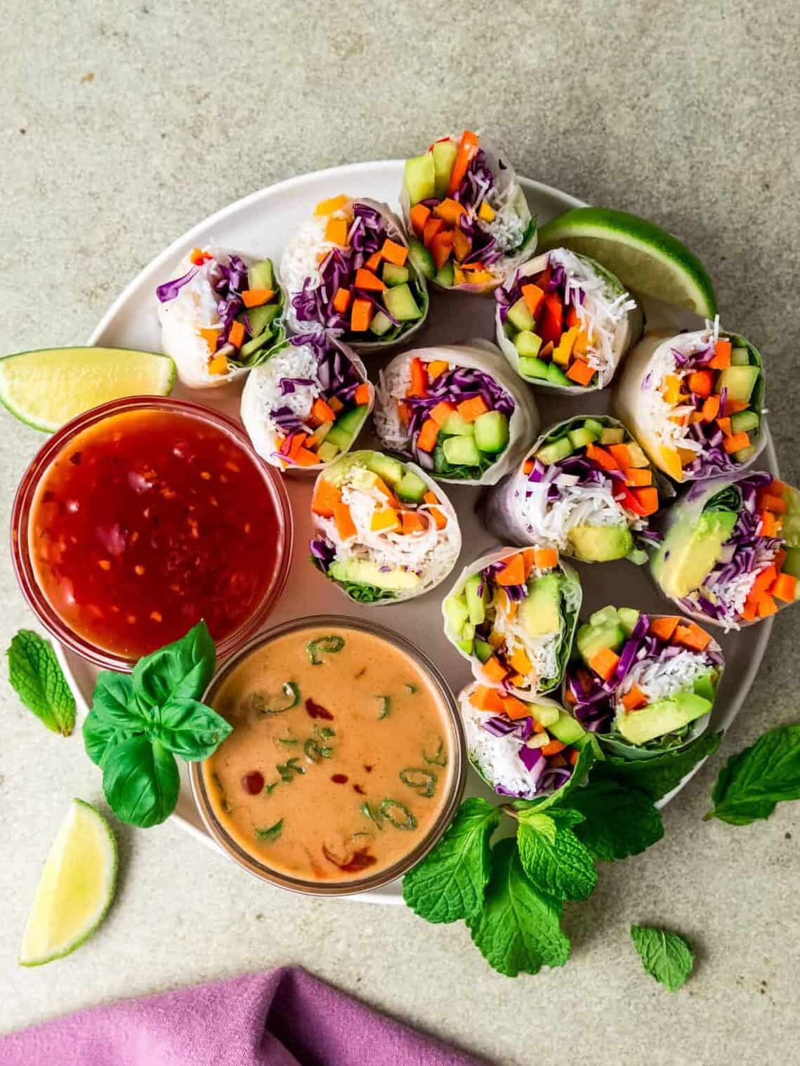 Vegetable rice paper rolls with peanut sauce and sweet chili sauce.