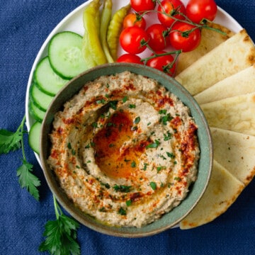 Authentic baba ganoush recipe drizzled with olive oil and paprika.