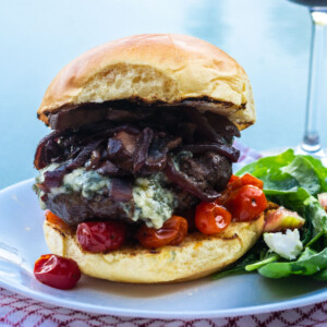 Blue cheese burger with caramelized onions and sautéed mushrooms.