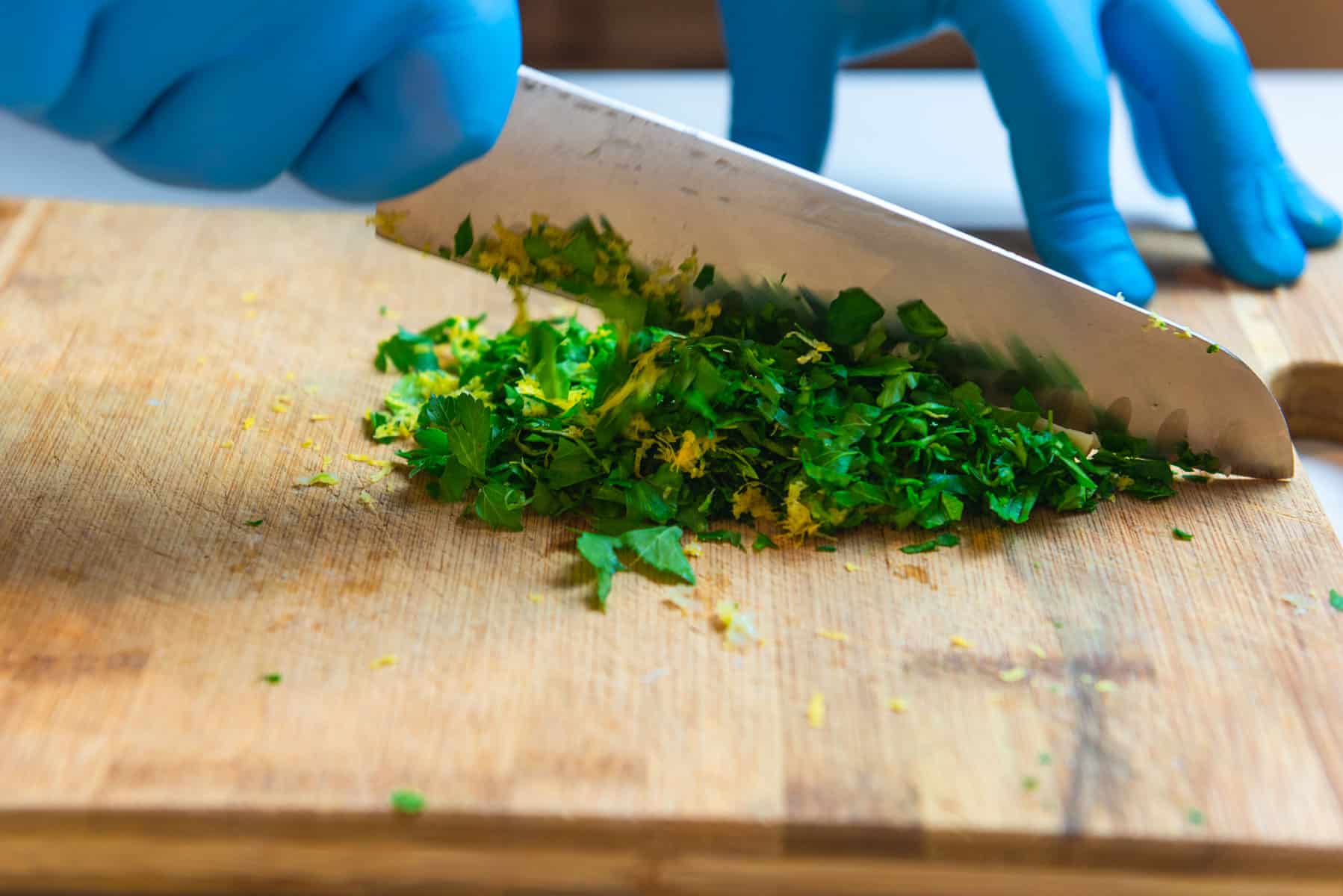 Chop the lemon zest, parsley and garlic together to combine the gremolata.