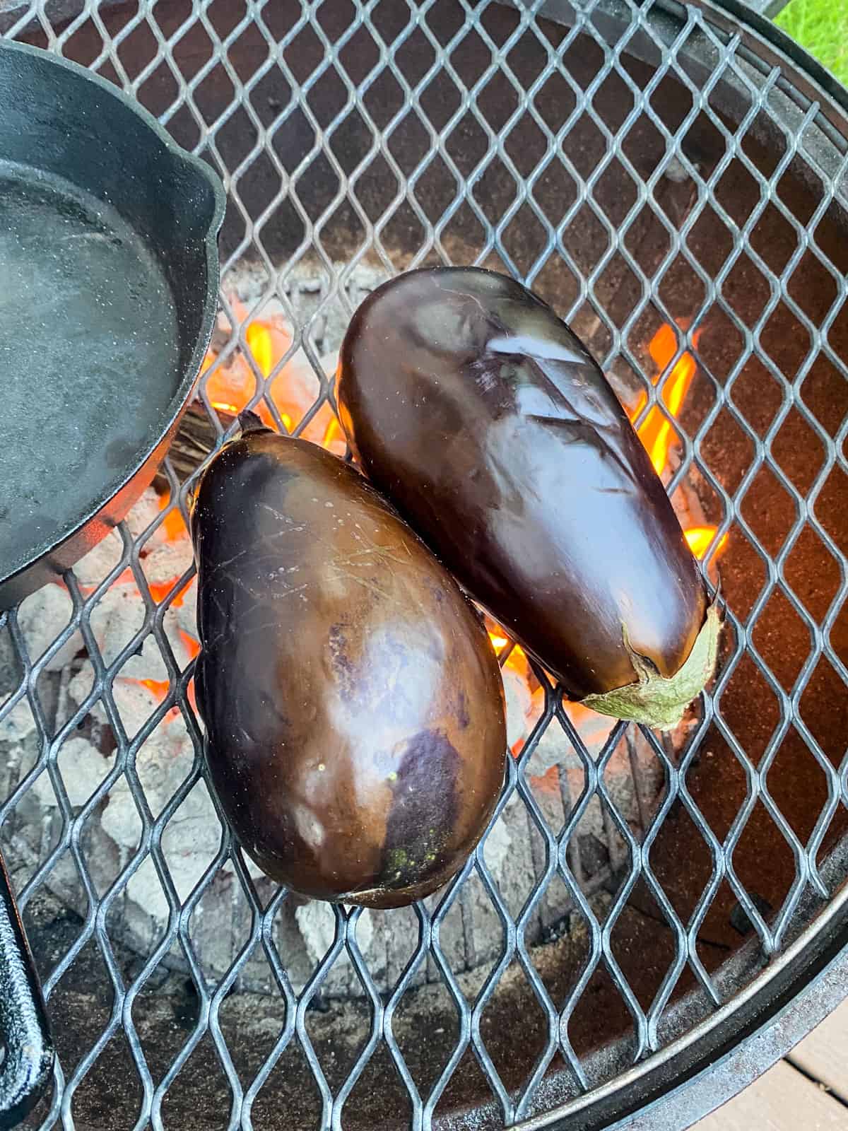 Grill whole eggplant on a charcoal grill.