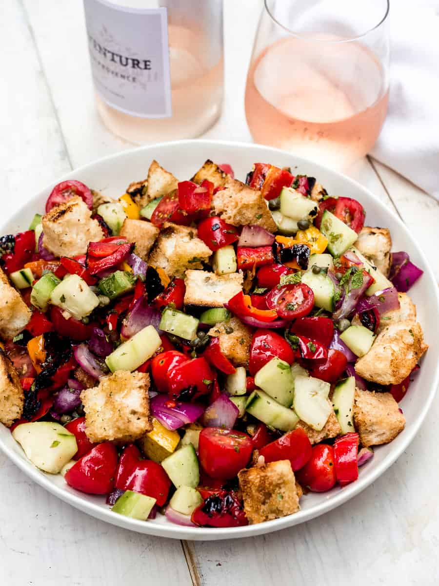Summer grilled panzanella salad with grilled bell peppers and onions tossed with grilled bread and fresh vegetables.