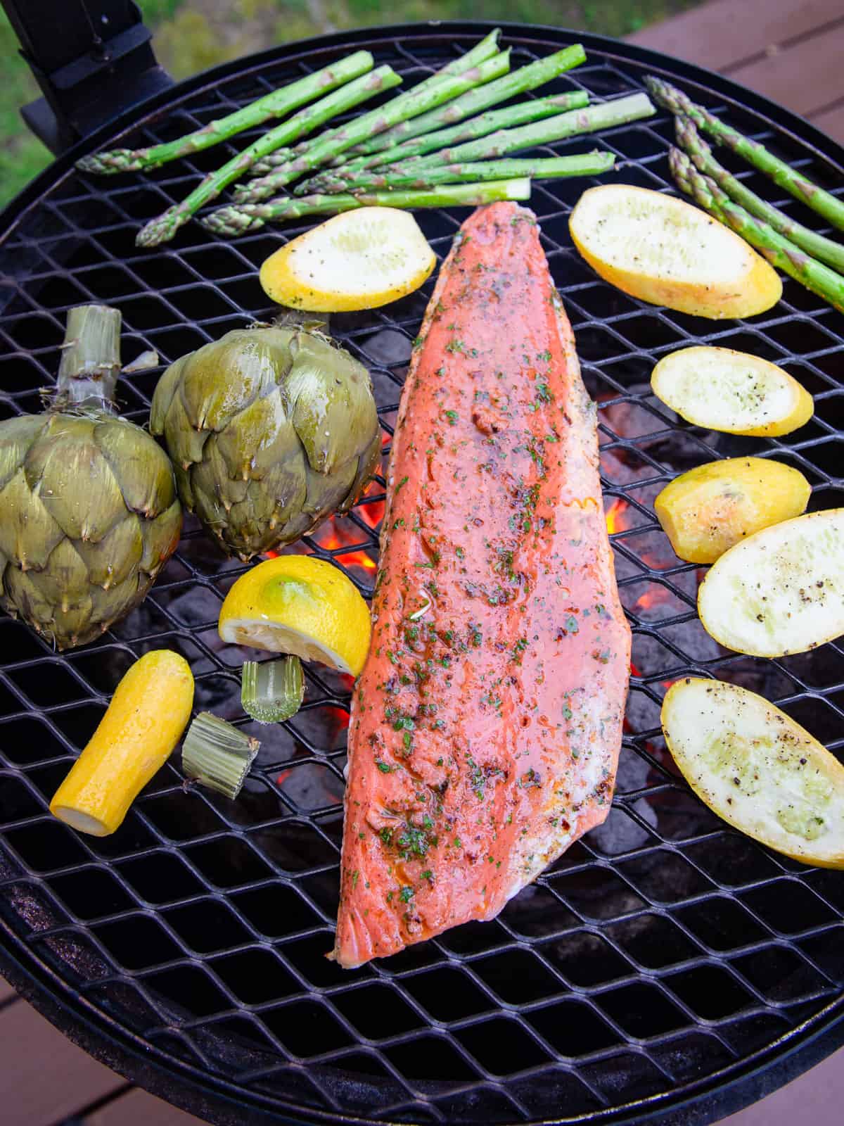Grill the sockeye salmon with vegetables until the salmon is just cooked through.