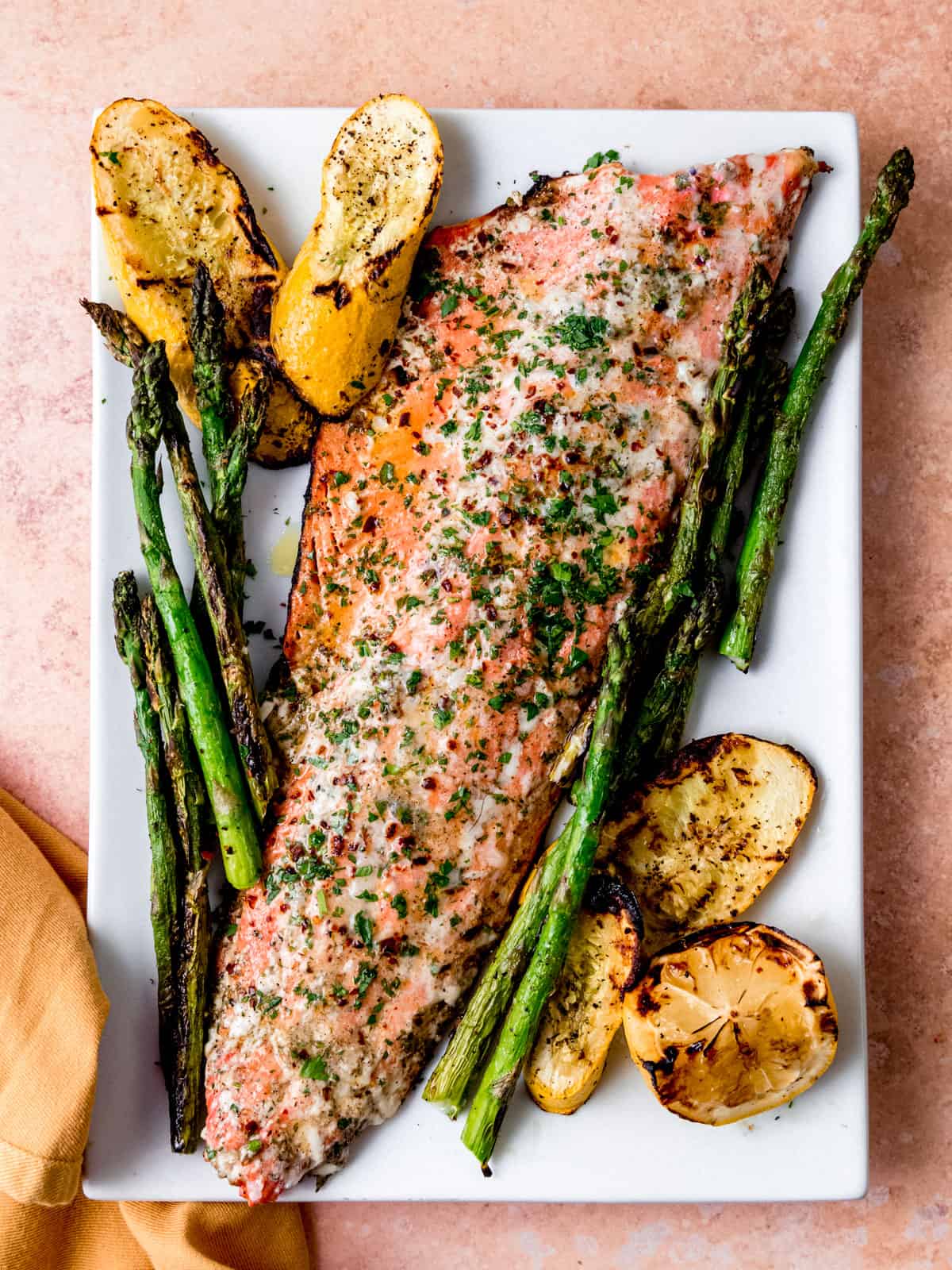 Grilled sockeye salmon recipe served with grilled asparagus and summer squash.