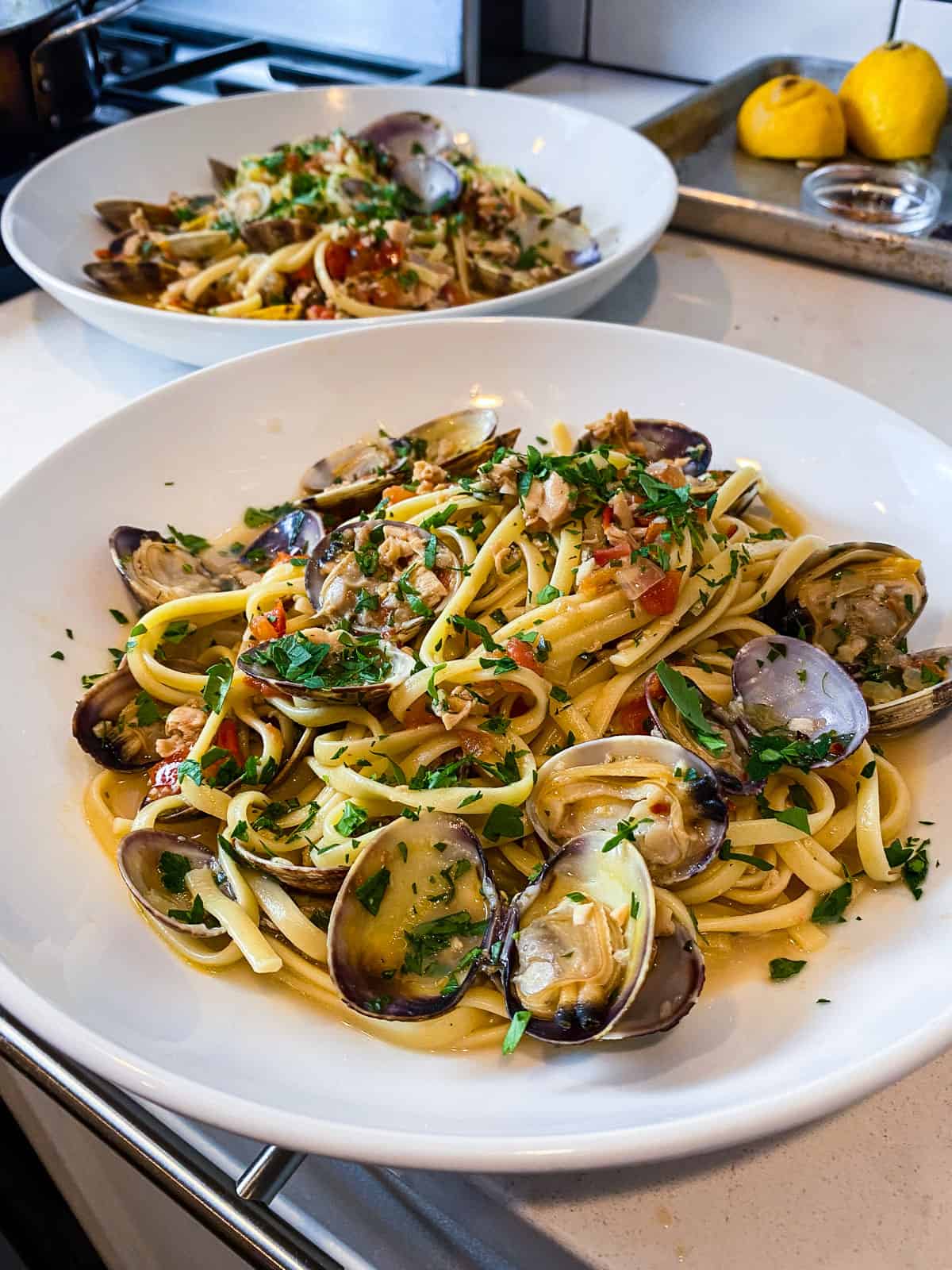 Serve the linguine and clams in wide bowls garnished with fresh parsley.