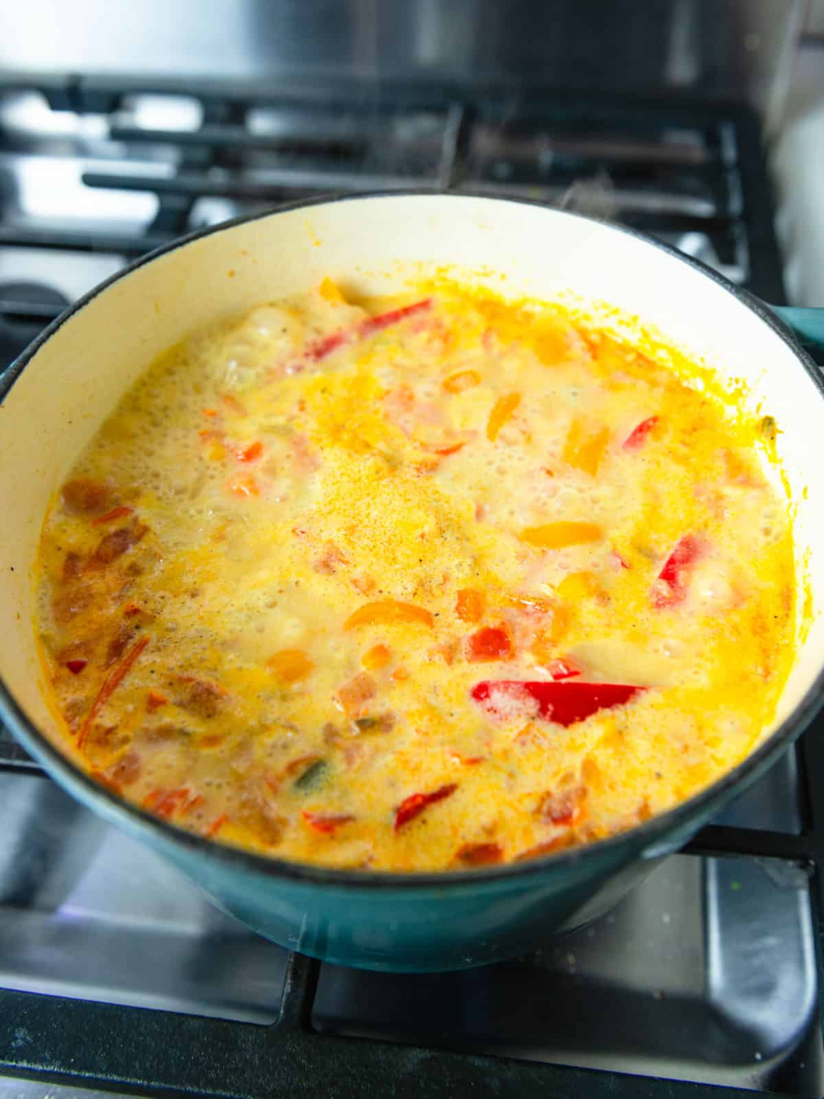 Simmer the moqueca for 15-18 minutes until fish is just cooked through.