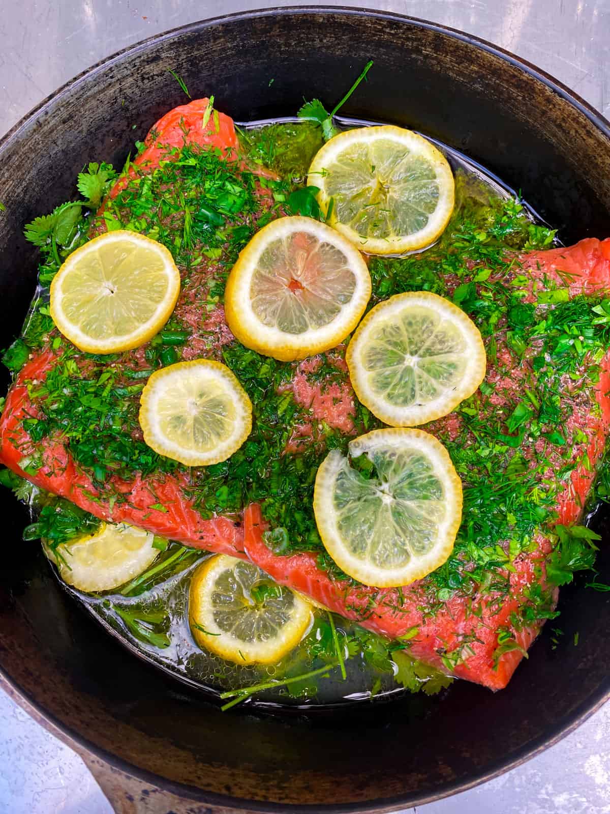 Cook the herb crusted salmon until the salmon is just cooked through, about 10-12 minutes.