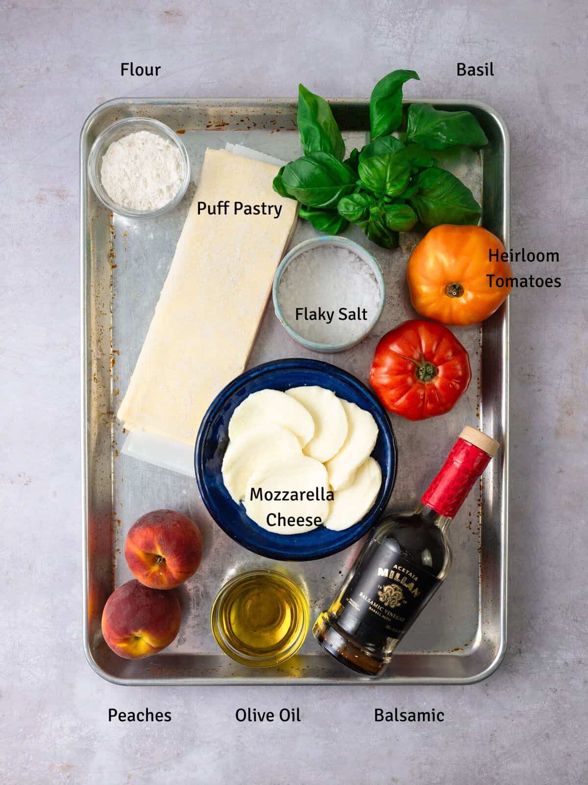 Ingredients for caprese tart with puff pastry, peaches and aged balsamic.