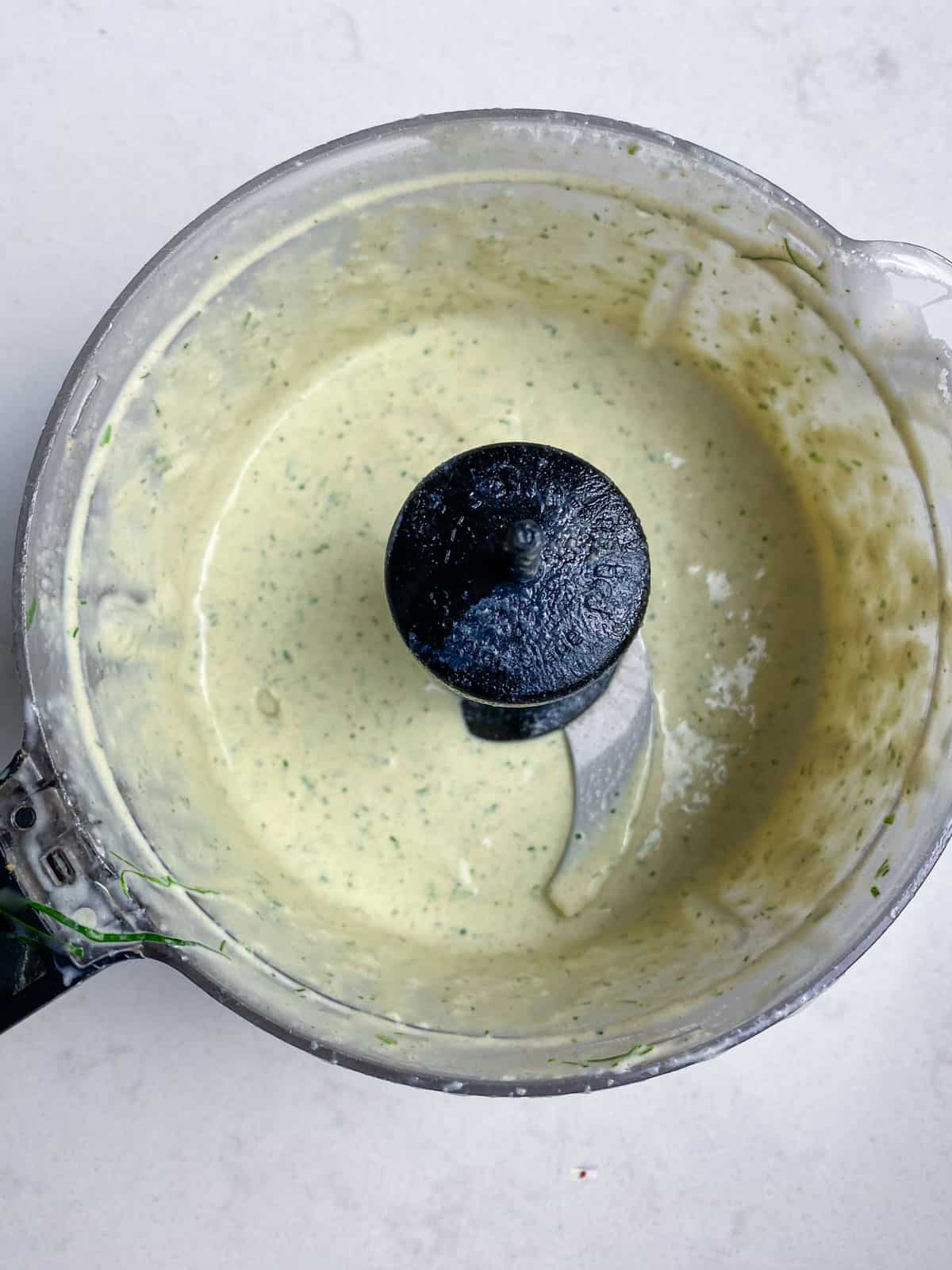 Blend the herb tahini sauce until smooth and pourable.