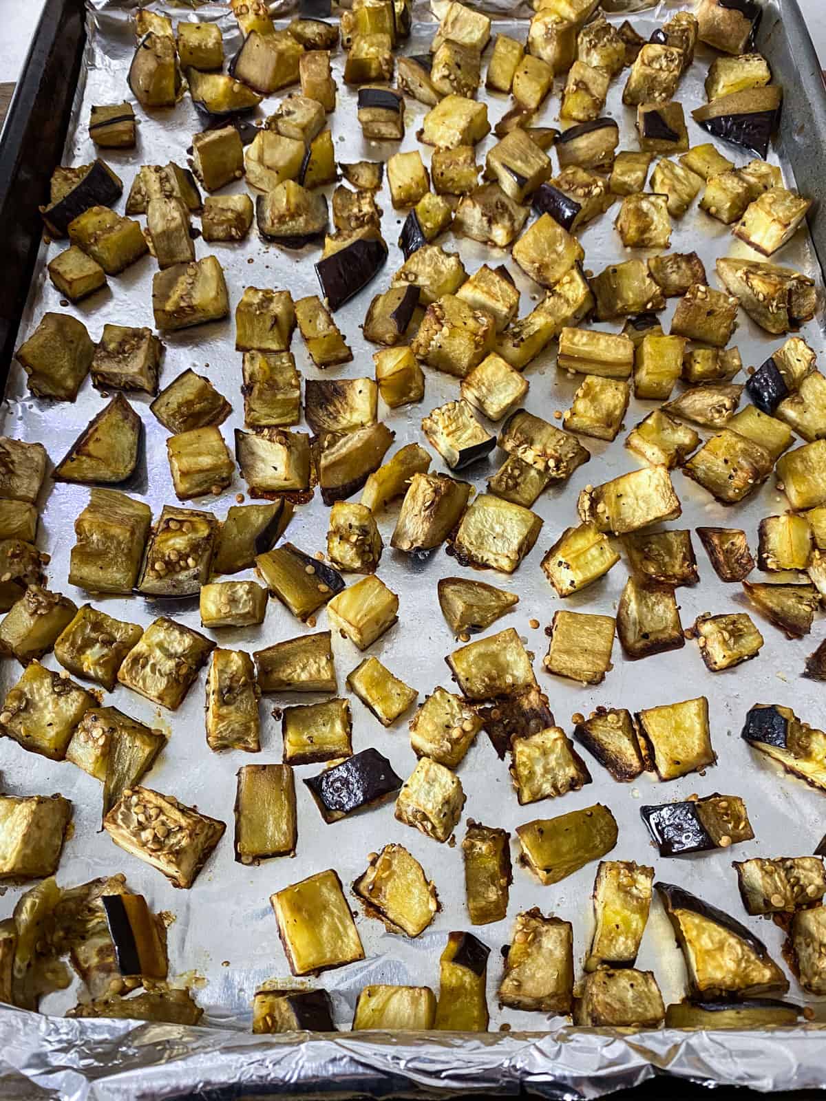 Roast the eggplant cubes until soft and slightly caramelized.