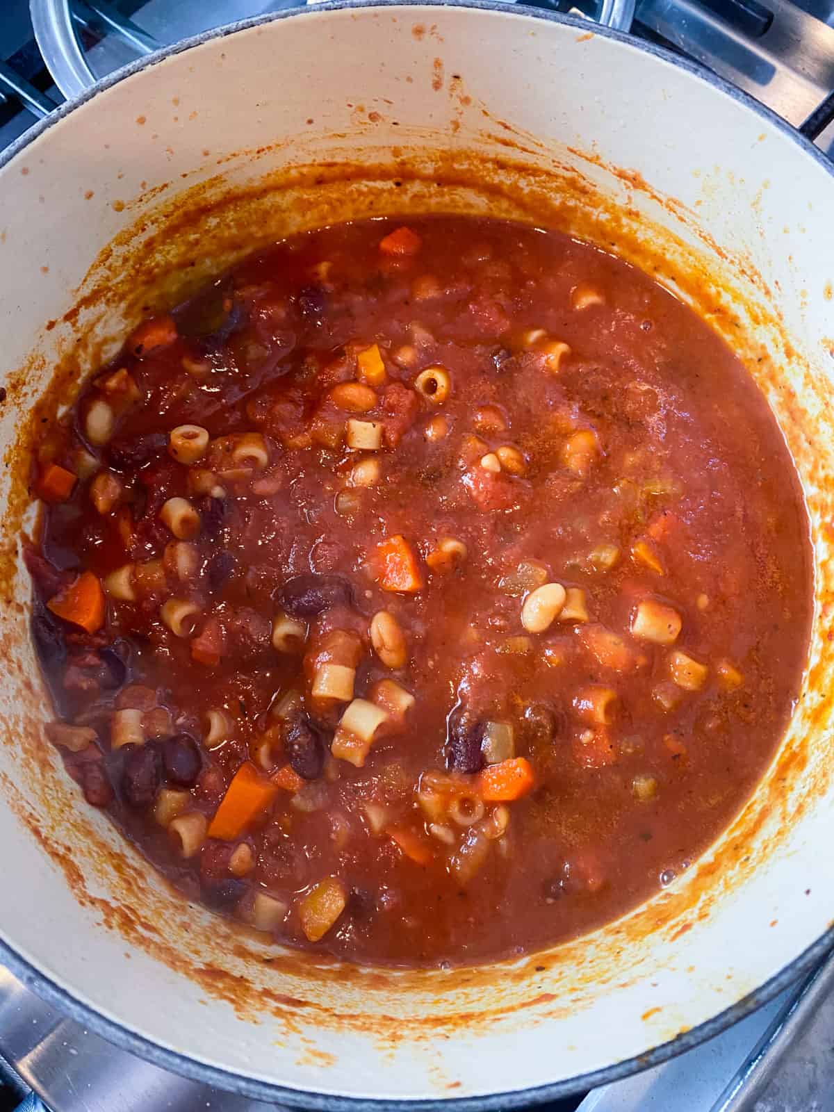 Continue simmering the pasta fagioli until the pasta is cooked through and soup thickens.