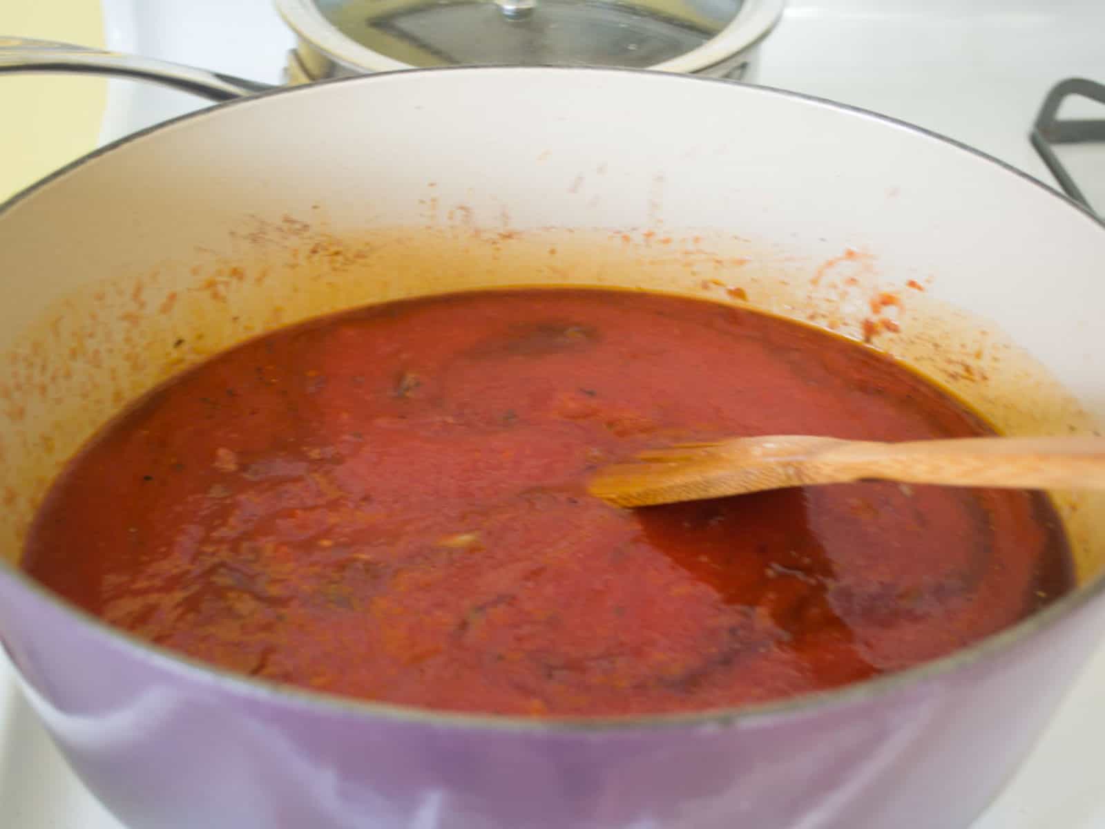 Simmer the tomato sauce before adding the beef braciole in.