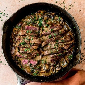Steak marsala with mushrooms and herbs.