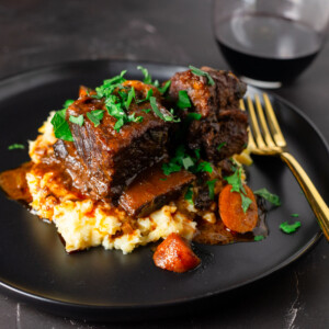 Red wine short ribs served over mashed parsnips.