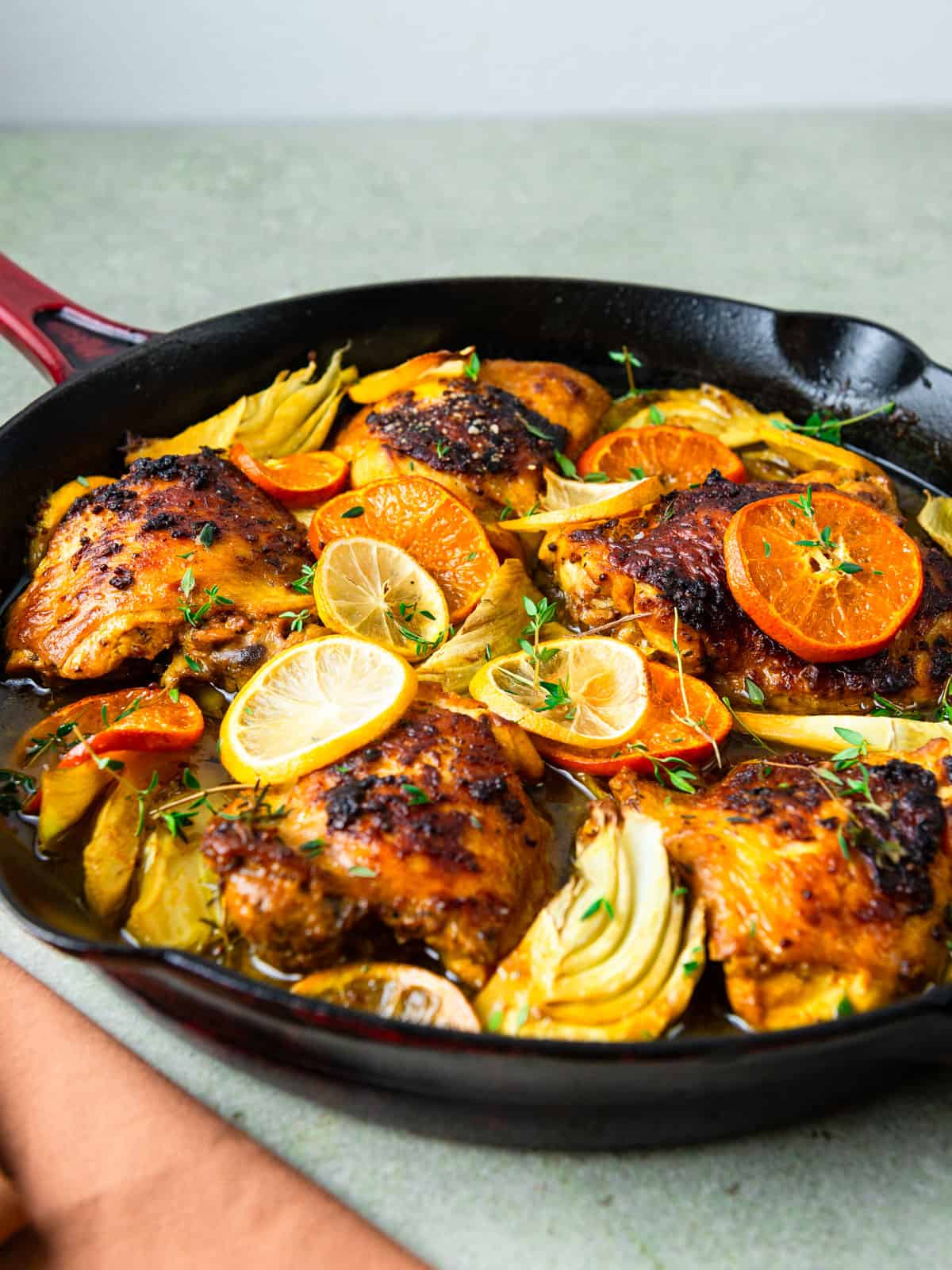 Citrus roasted chicken thighs with turmeric, fennel and fresh thyme.