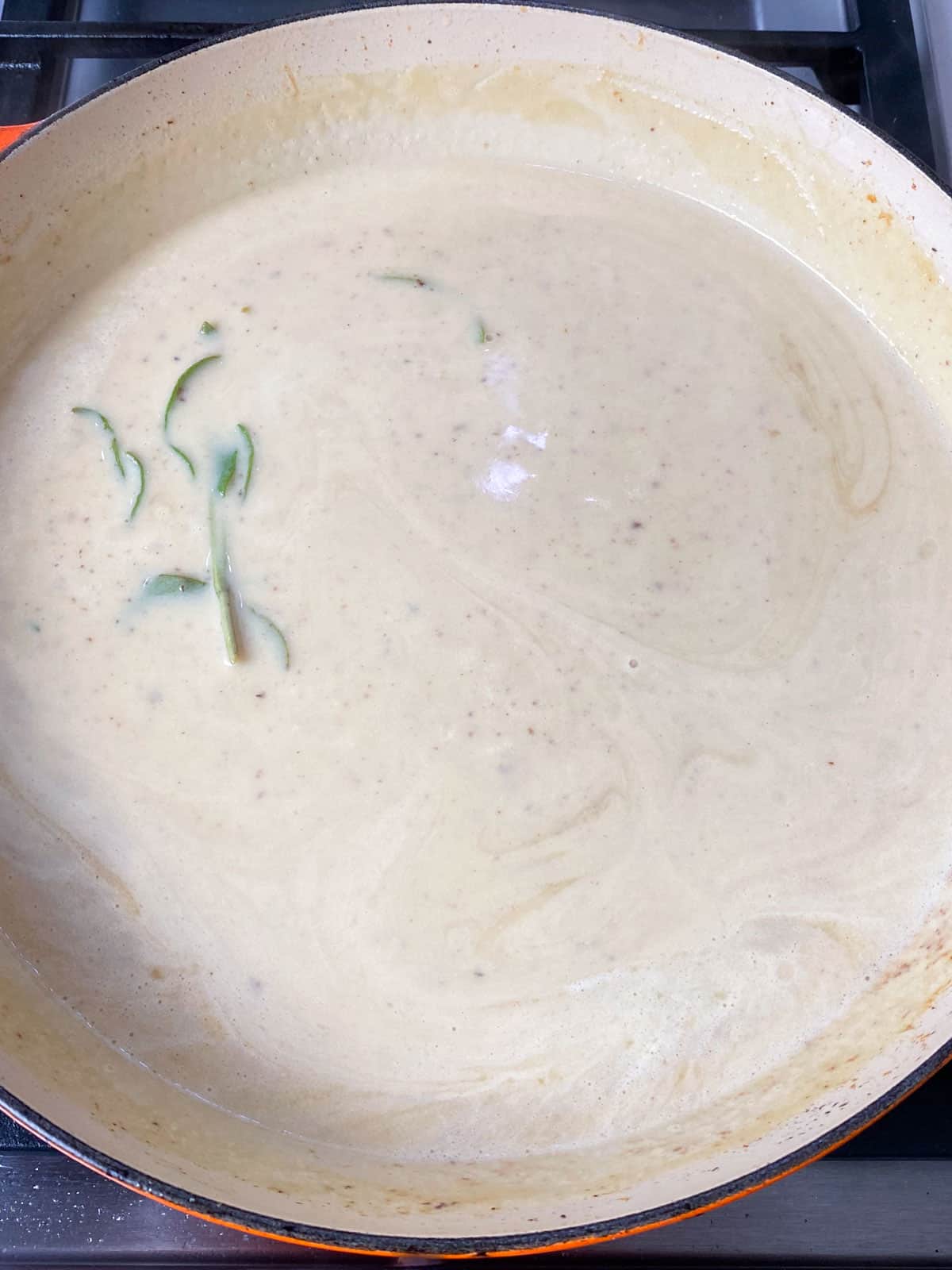 Add the heavy cream to the gravy and stir to combine.