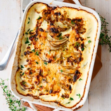 Recipe for potato and leek gratin with fresh thyme.