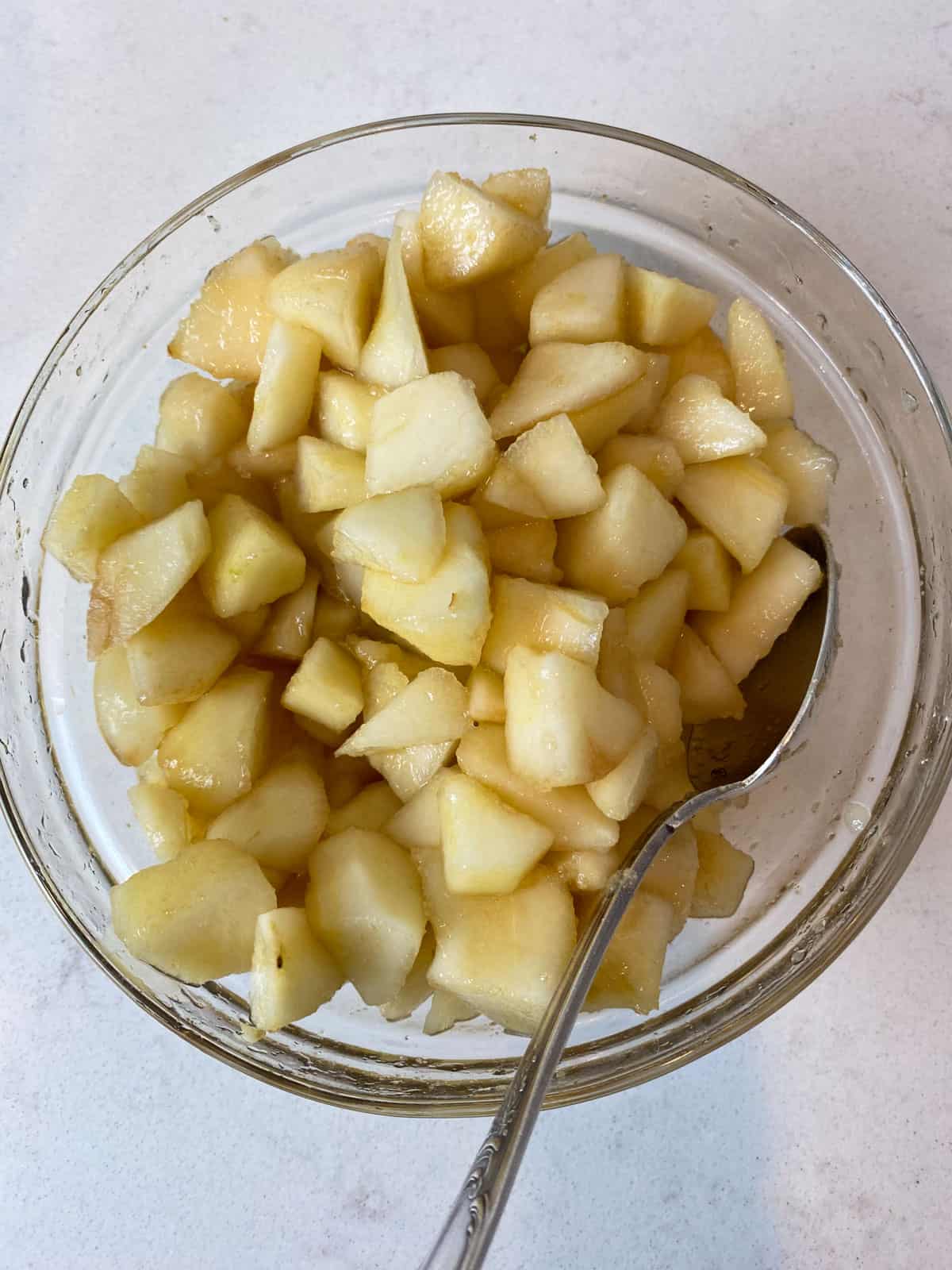 Toss the chopped pears with brown sugar.