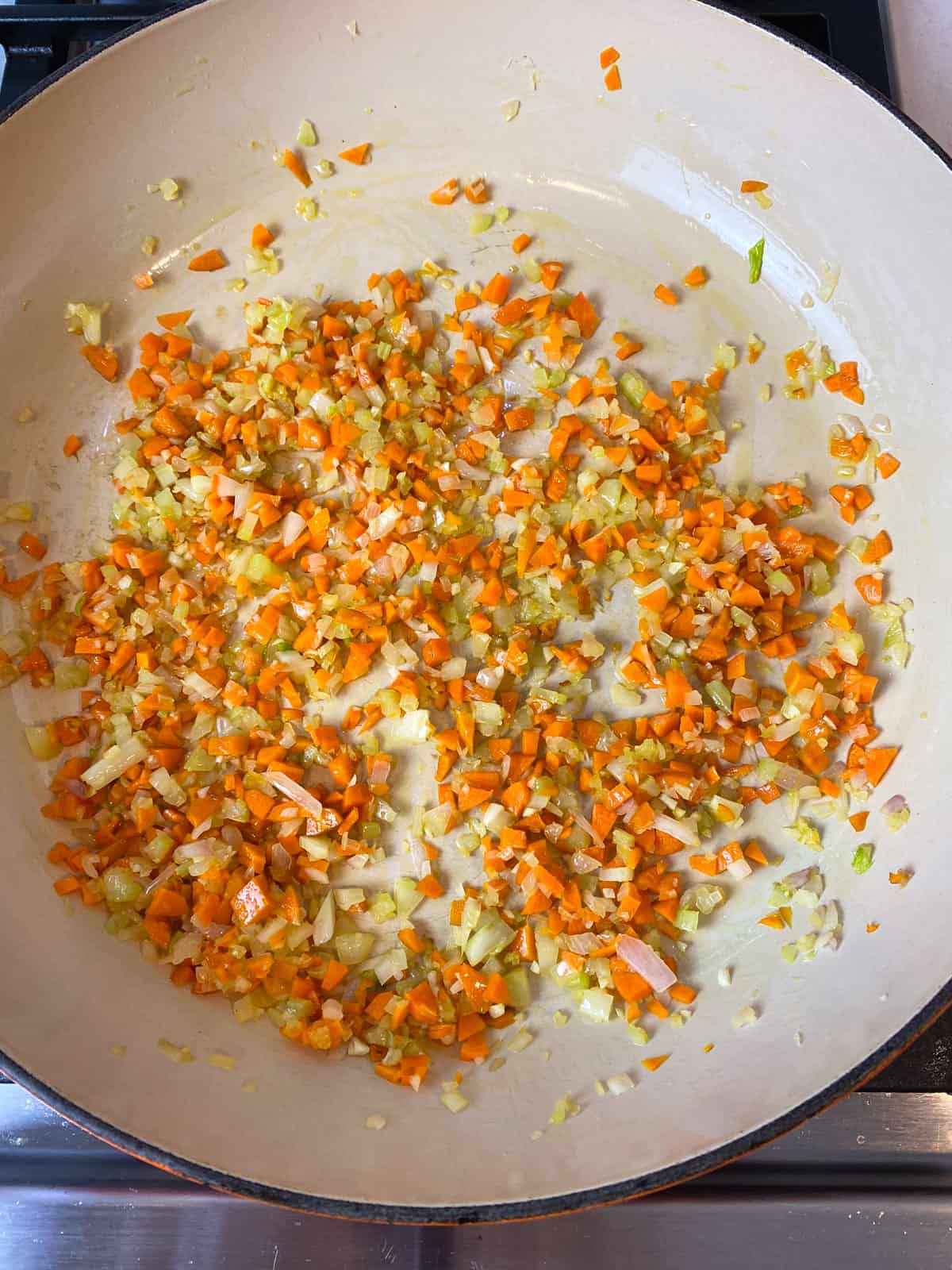 Saute chopped carrot, celery and shallot in olive oil until softened.