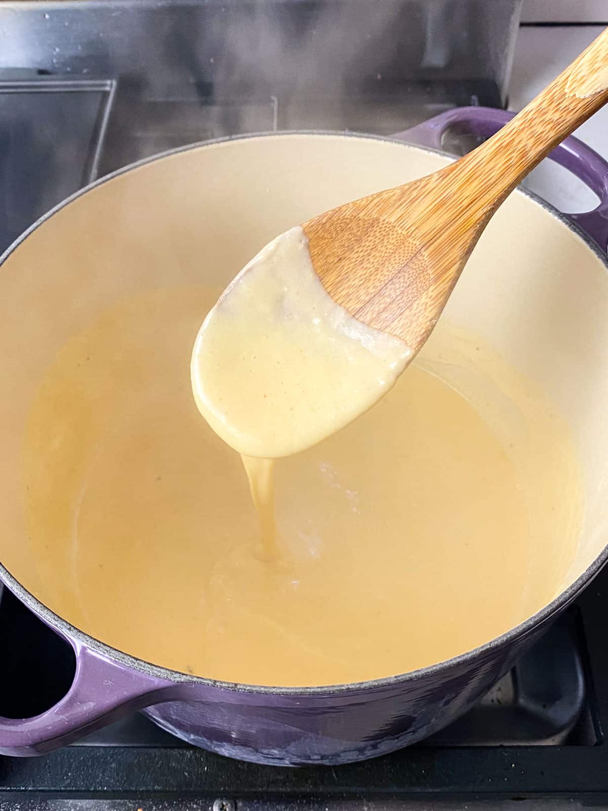 Whisk the bechamel over low-medium heat until thickened.