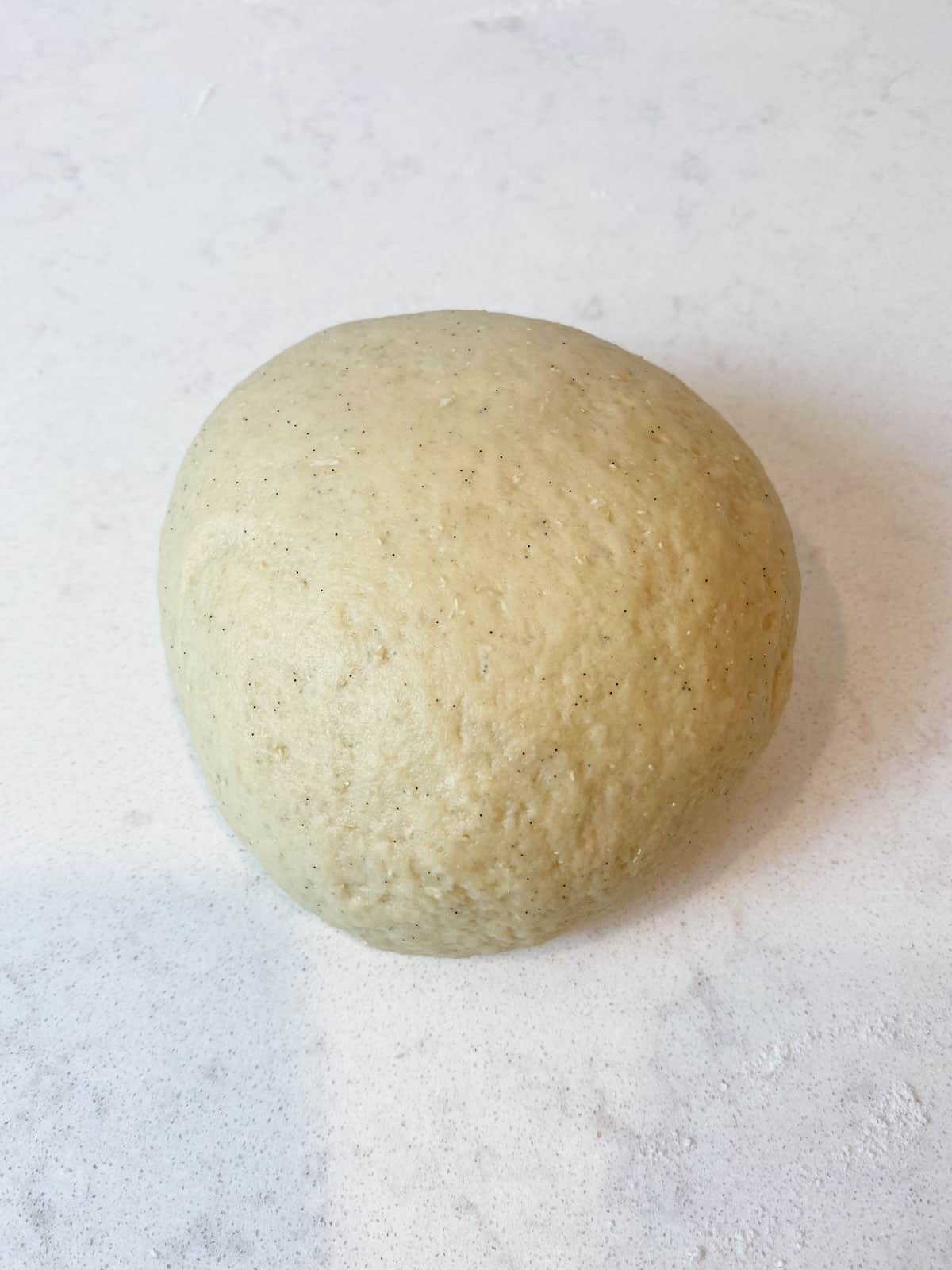 Knead the makowiec dough into a small round ball.