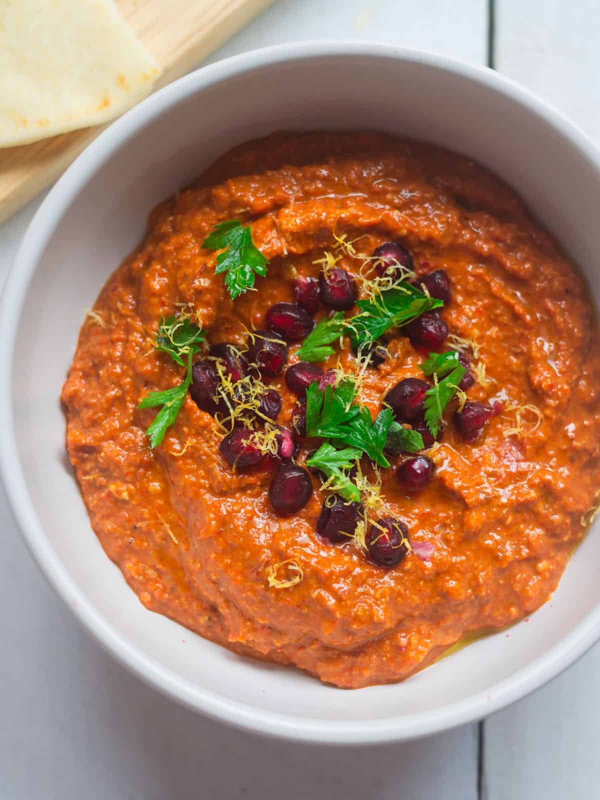 Muhammara recipe is a Turkish red pepper and walnut dip with warm spices and pomegranate molasses.