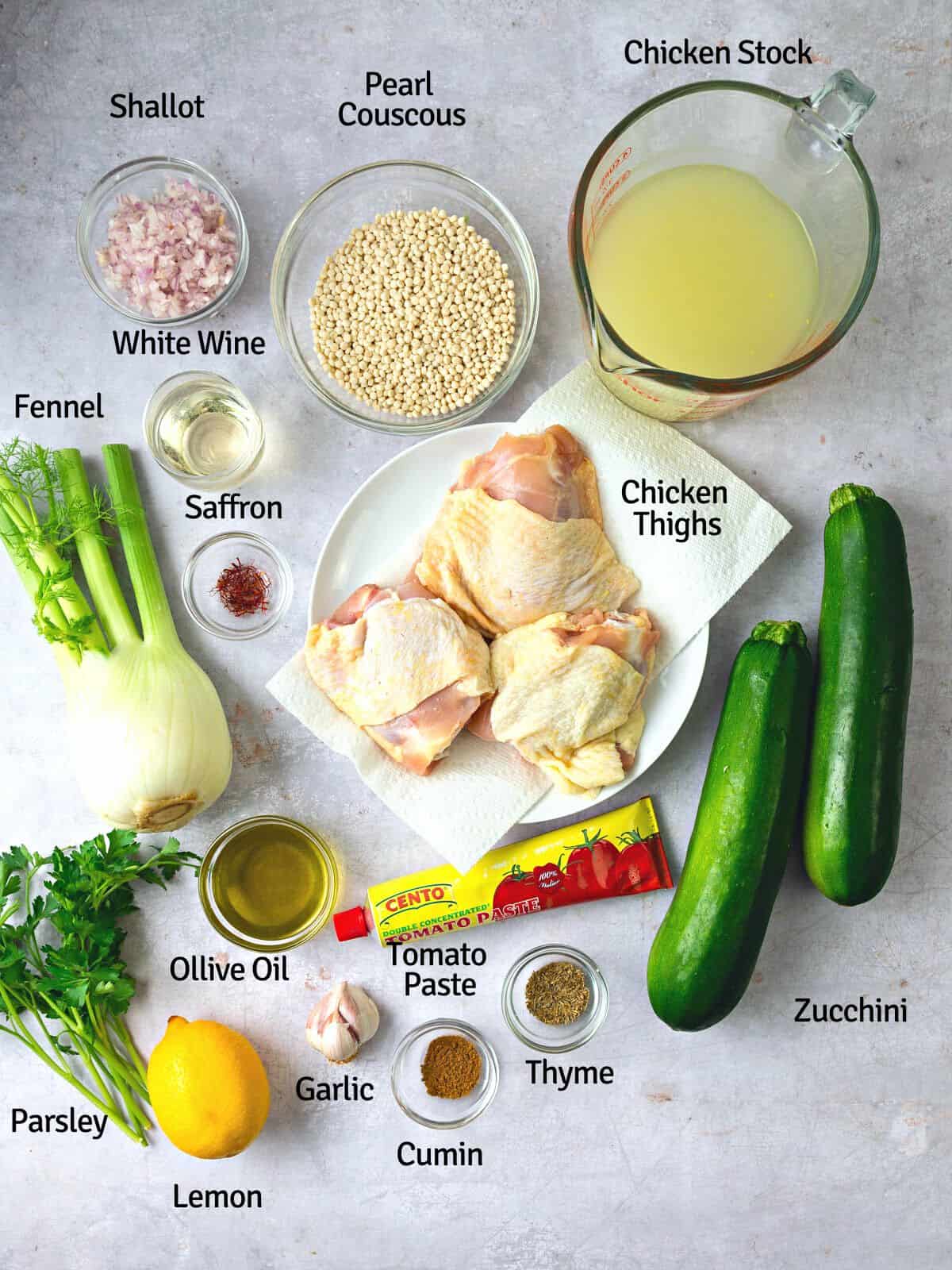 Ingredients for one pot Israeli couscous with chicken, including tomato paste, spices, fennel and white wine.