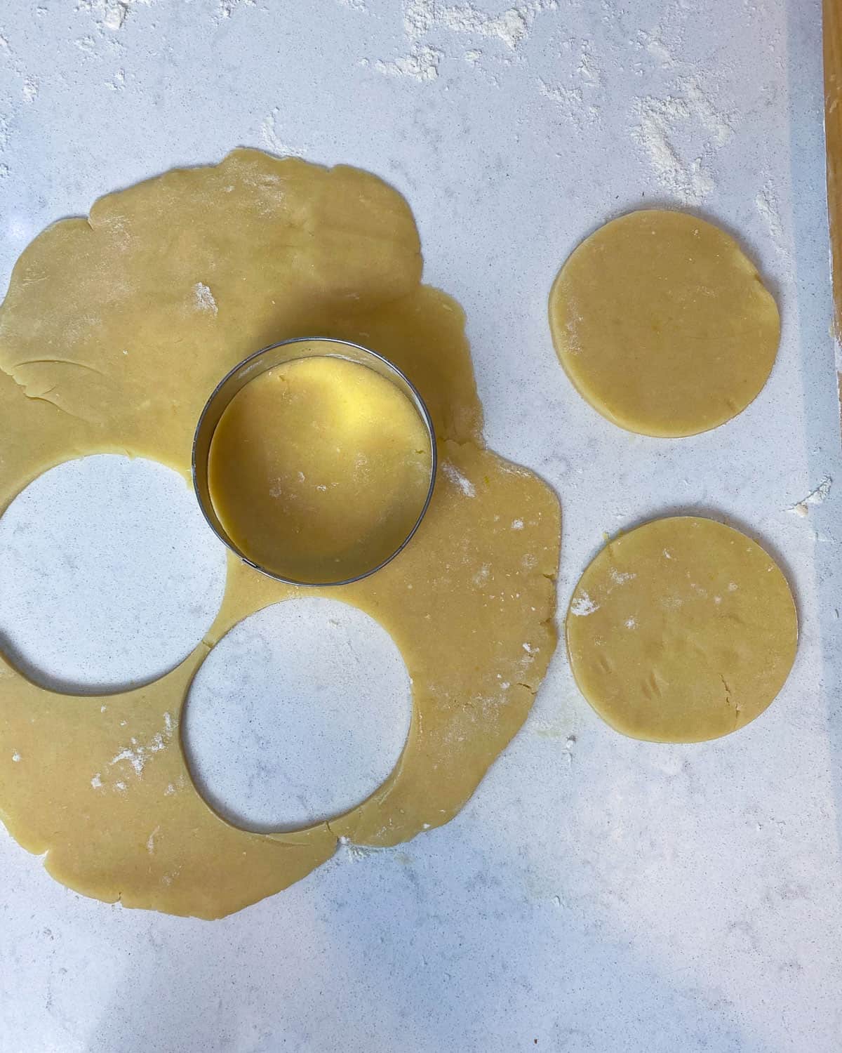 Use a 3 inch round cookie cutter to cut out circles from the rolled out cookie dough.