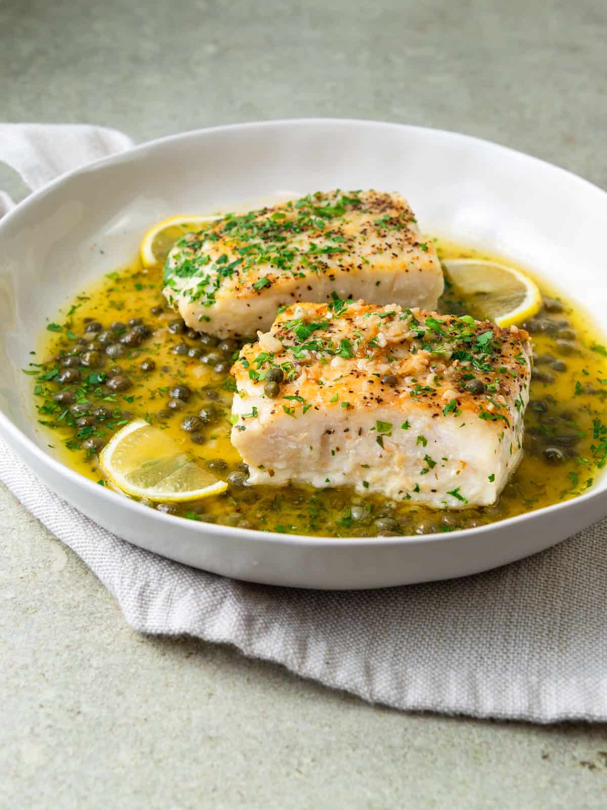 Halibut piccata recipe in a white wine and caper sauce.