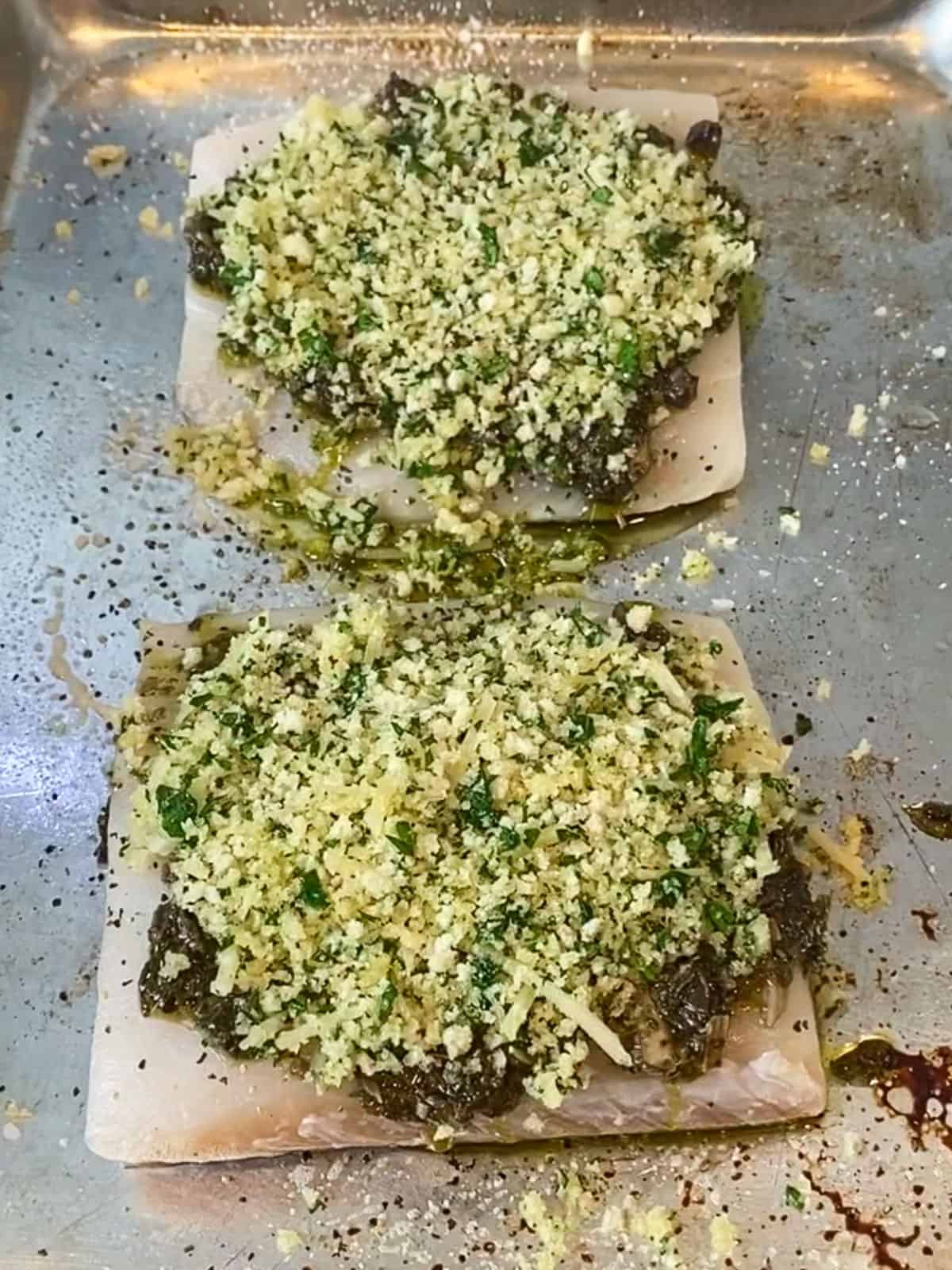 Layer the panko mixture on top of the pesto halibut and gently press down so the panko sticks.
