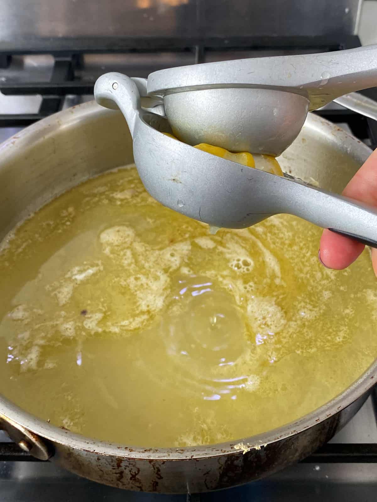 Add fresh lemon juice to the chicken francese sauce.