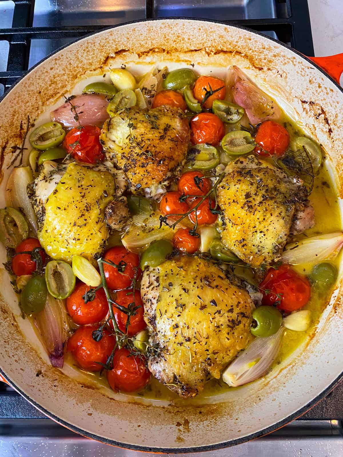 Cook the chicken Provencal in the oven for 30 minutes until the chicken is cooked through and vegetables are tender.