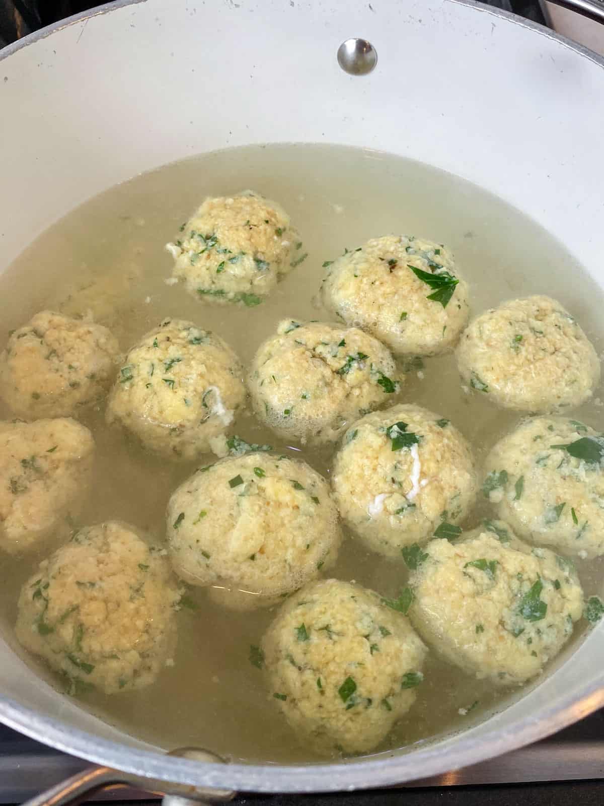 Place the matzo balls into a pot of boiling water and cook for 30 minutes.