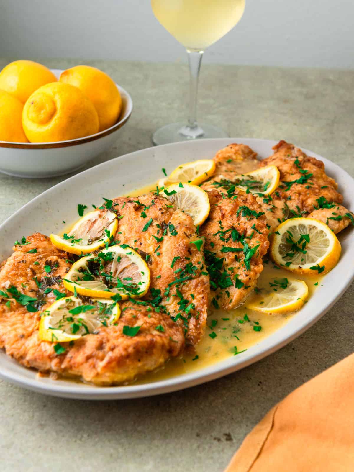 Lemony chicken francese with white wine and butter.