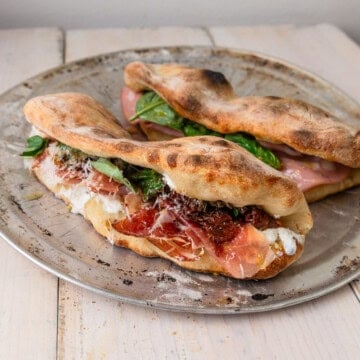 Pizza sandwich filled with prosciutto, sundried tomatoes and creamy ricotta cheese.