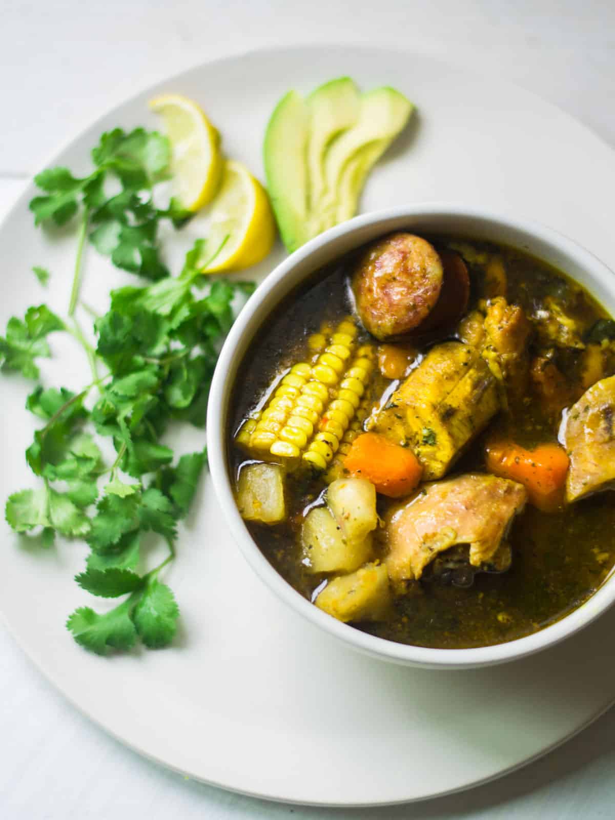 Dominican sancocho stew with corn and yucca.