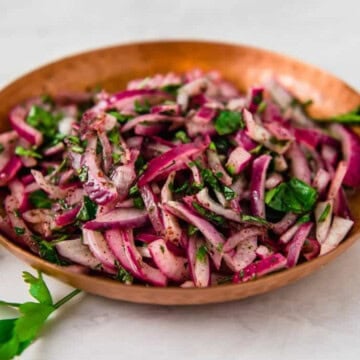 Turkish sumac onion salad with fresh parsley, lemon juice and olive oil.