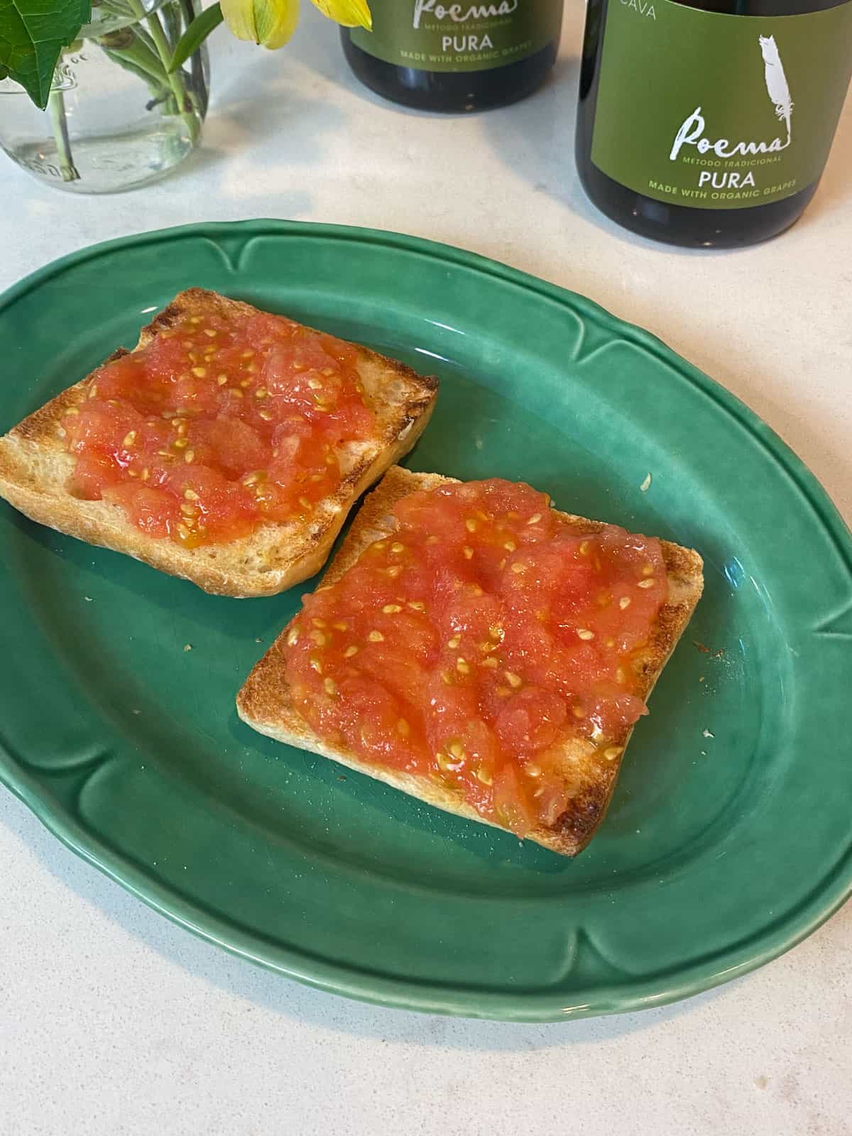 Spread tomato pulp on the toasted ciabatta bread.