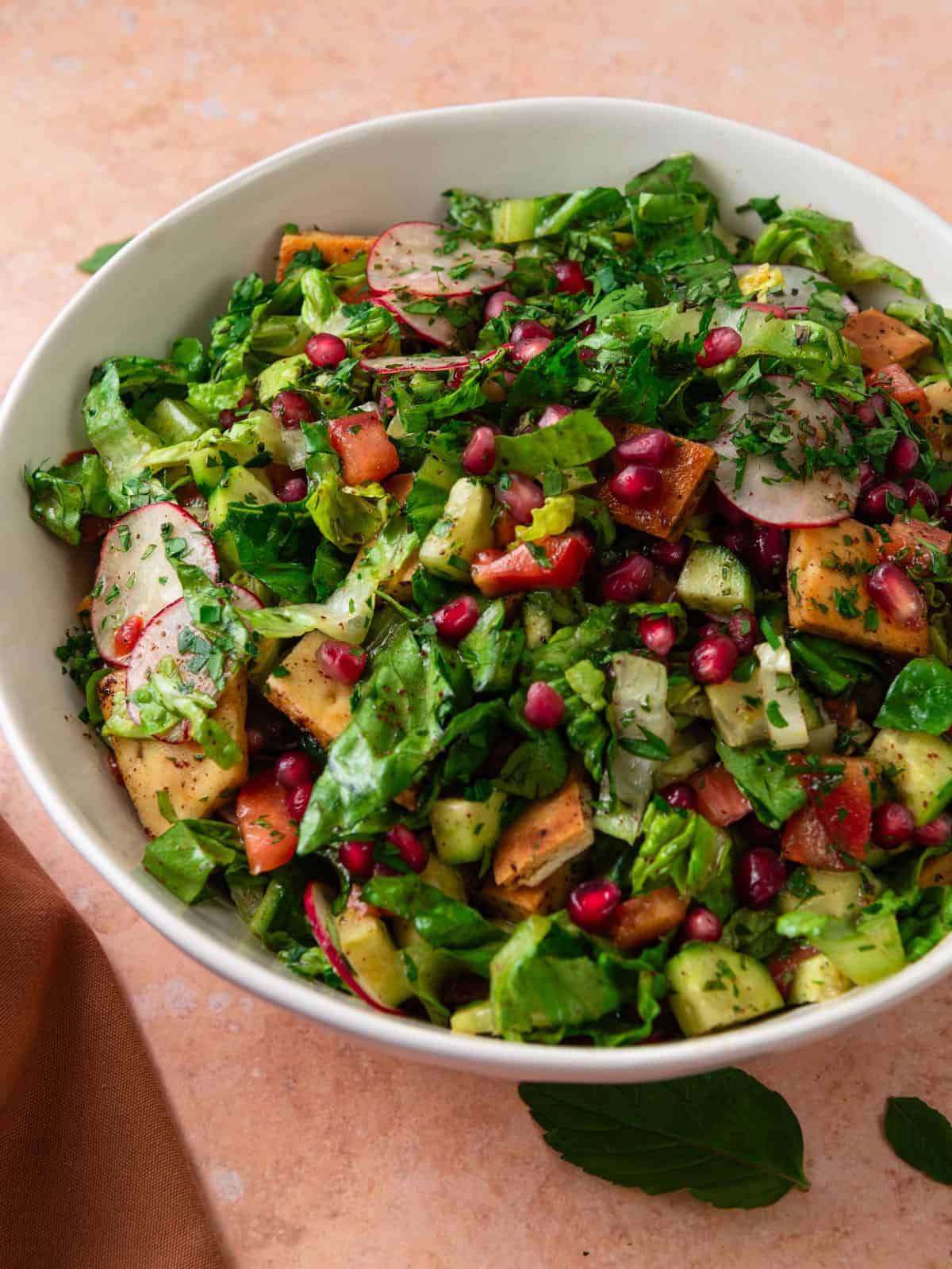 Mediterranean fattoush salad with pomegranate molasses.