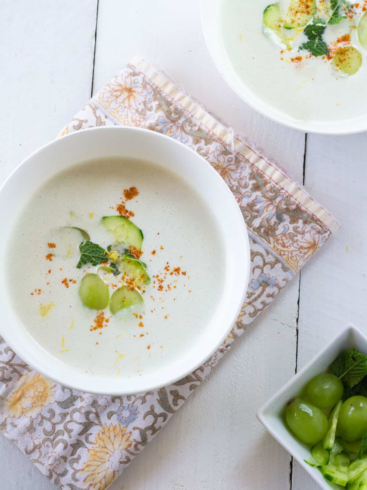Smooth white gazpacho with green grapes, garlic, cucumber and almonds.