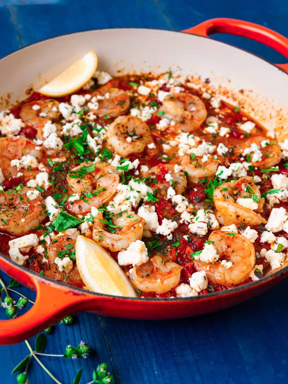 One pan Greek shrimp saganaki in a flavorful tomato sauce with feta cheese and lemon.