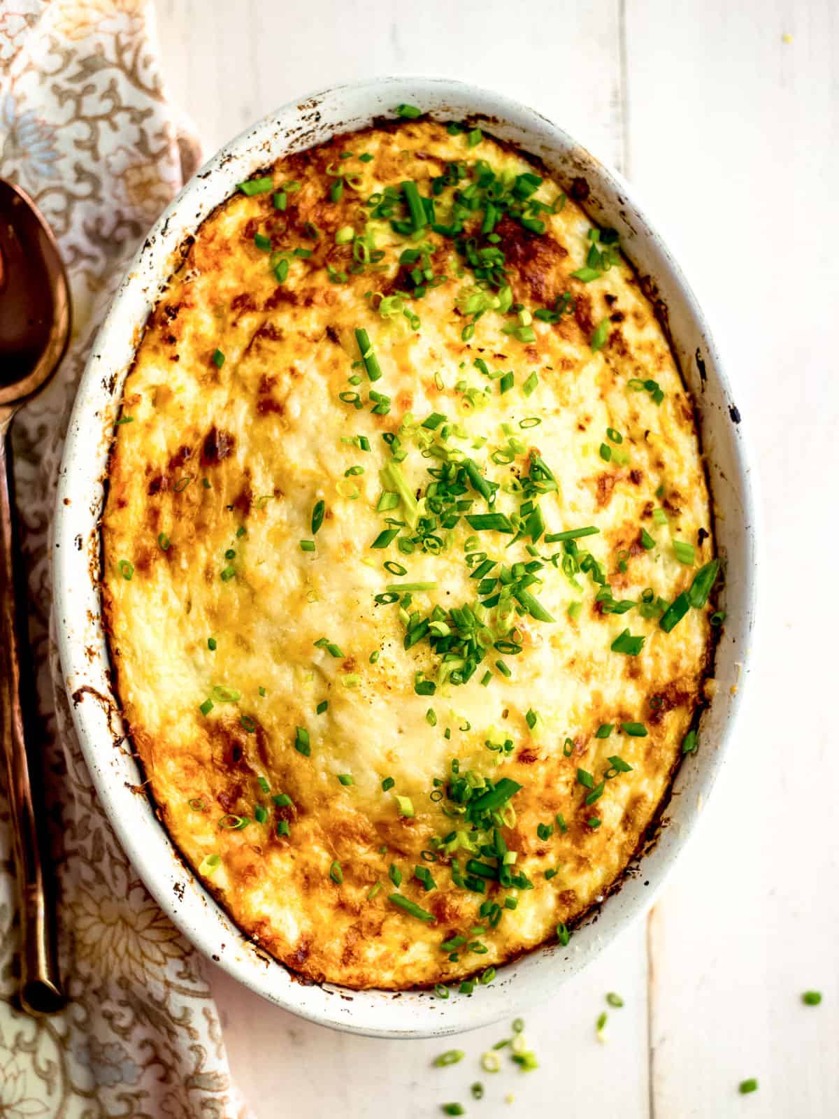 Yellow squash pie with ricotta cheese and Parmesan cheese.