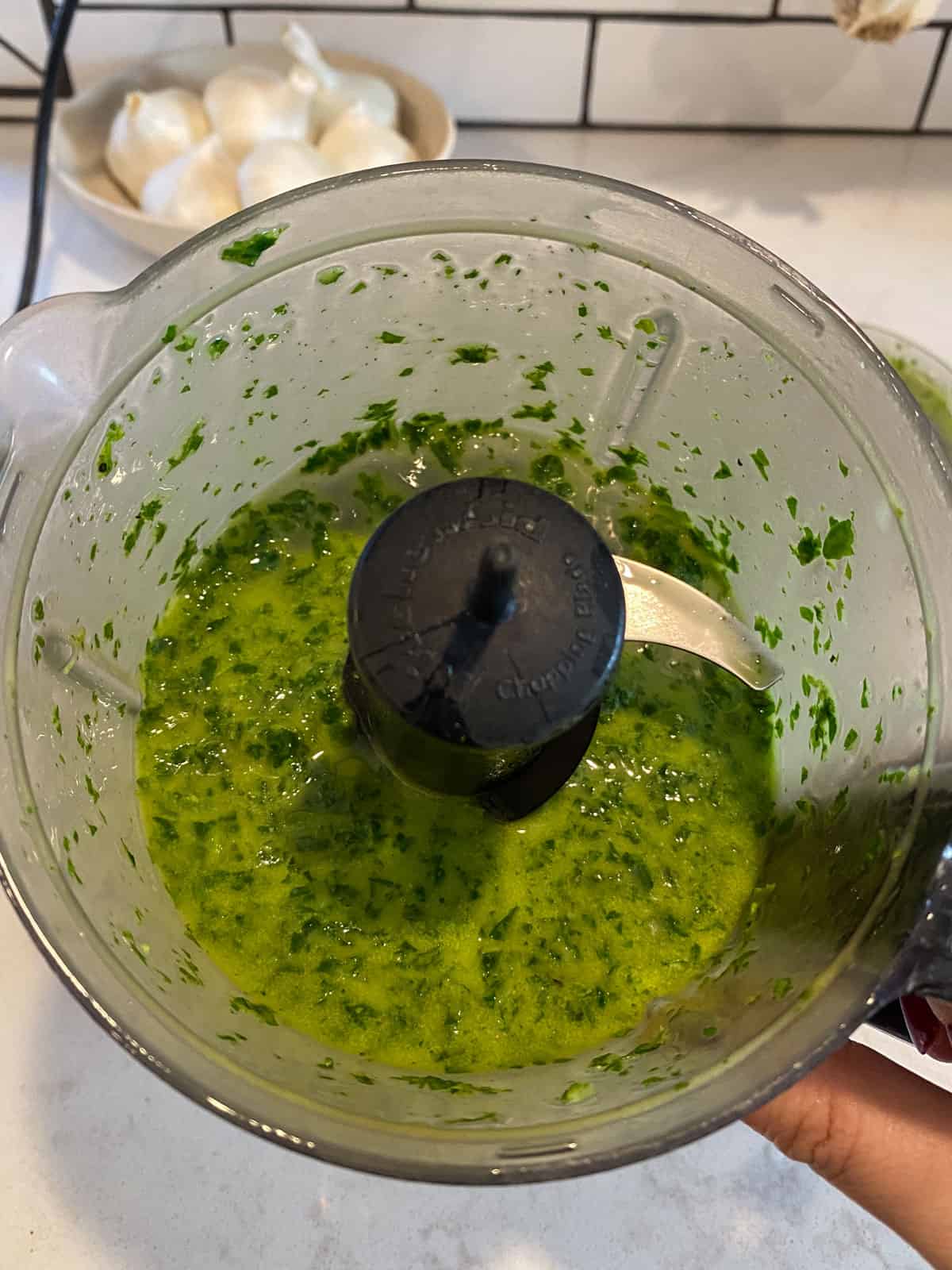 Blend the basil, olive oil and lemon juice in a food processor to form a pourable basil oil.