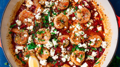 Greek shrimp saganaki recipe with feta in a rich tomato sauce.
